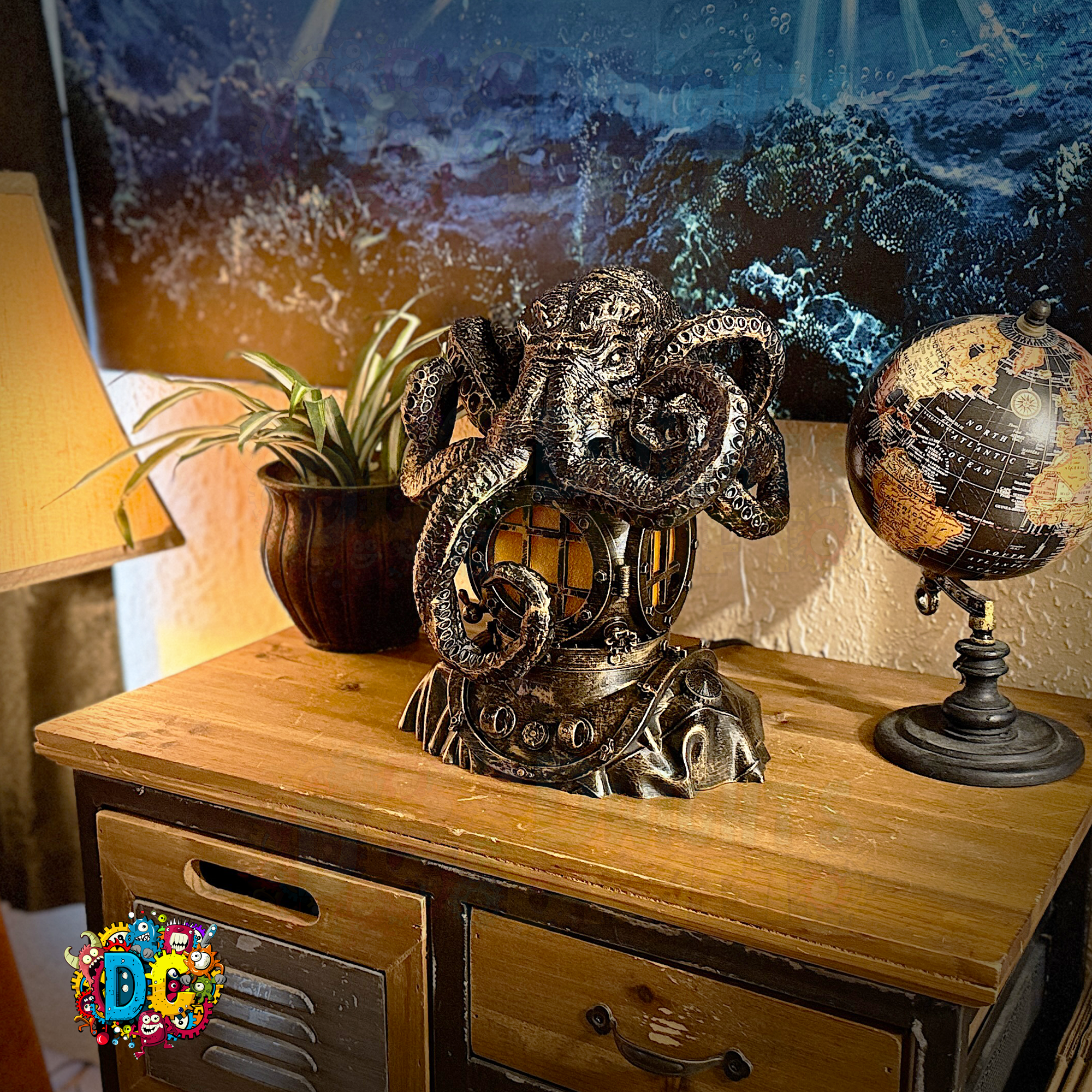 Decorative statue on a wooden surface with a globe and plant in the background