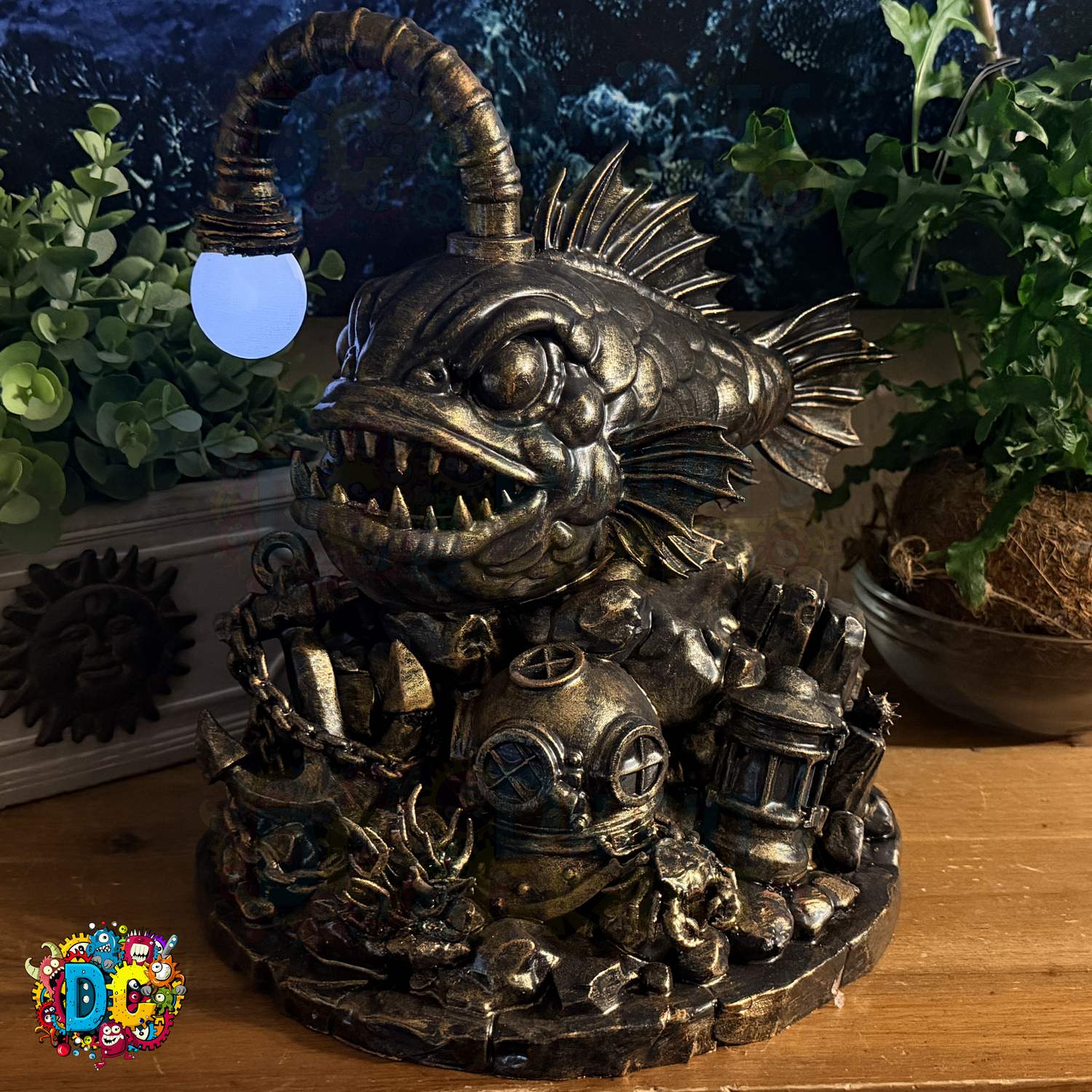 Decorative statue of a fish-like creature with ambient lighting on its head, surrounded by plants.