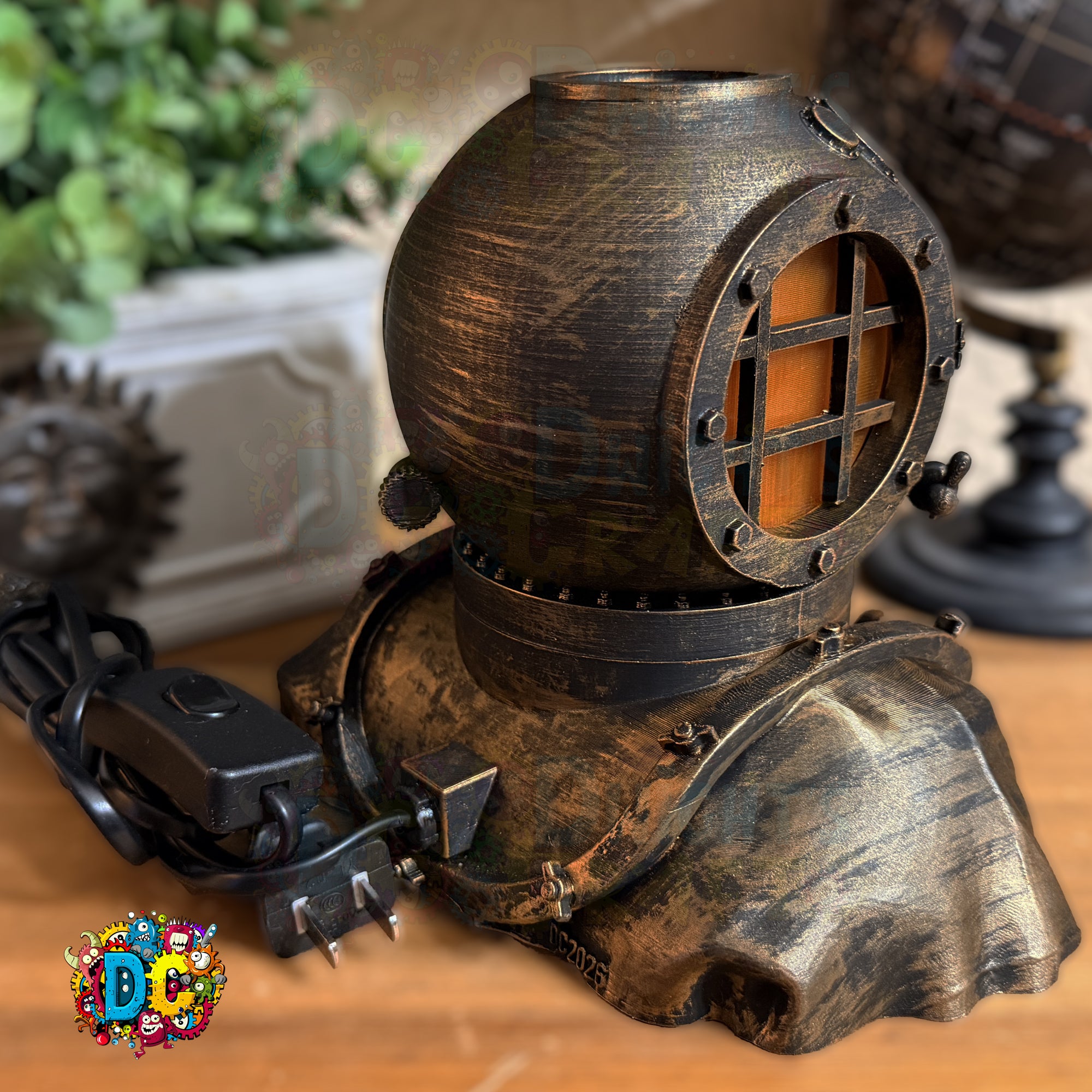 Decorative lamp shaped like a diving helmet on a wooden surface with a plant in the background