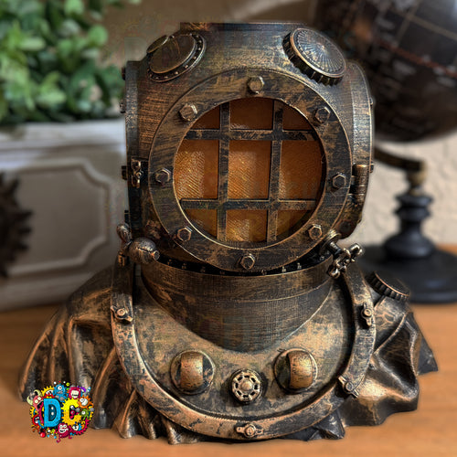 Steampunk-style metal helmet with intricate details on a wooden surface.