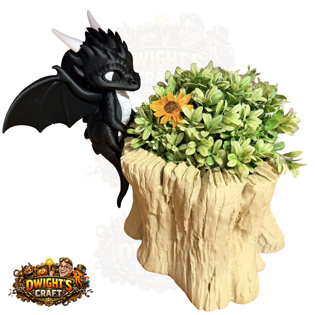 A fantasy garden figurine featuring a black dragon perched on a textured beige tree stump planter filled with green faux foliage and a single orange flower. The image has a 'Dwight's Craft' logo in the bottom-left corner and a faded 'Dwight's' watermark in the background.