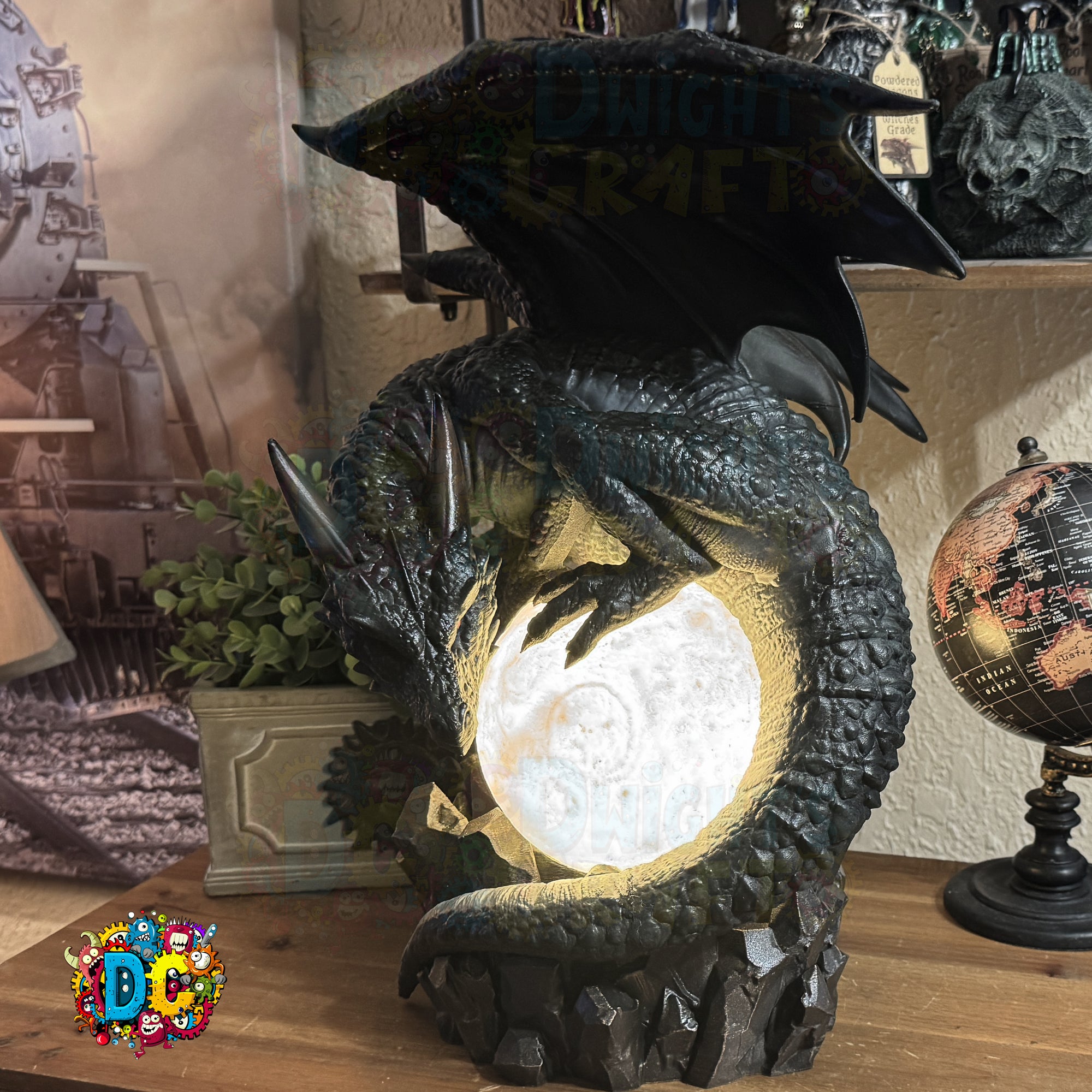 Dragon-shaped lamp on a wooden surface with a blurred background