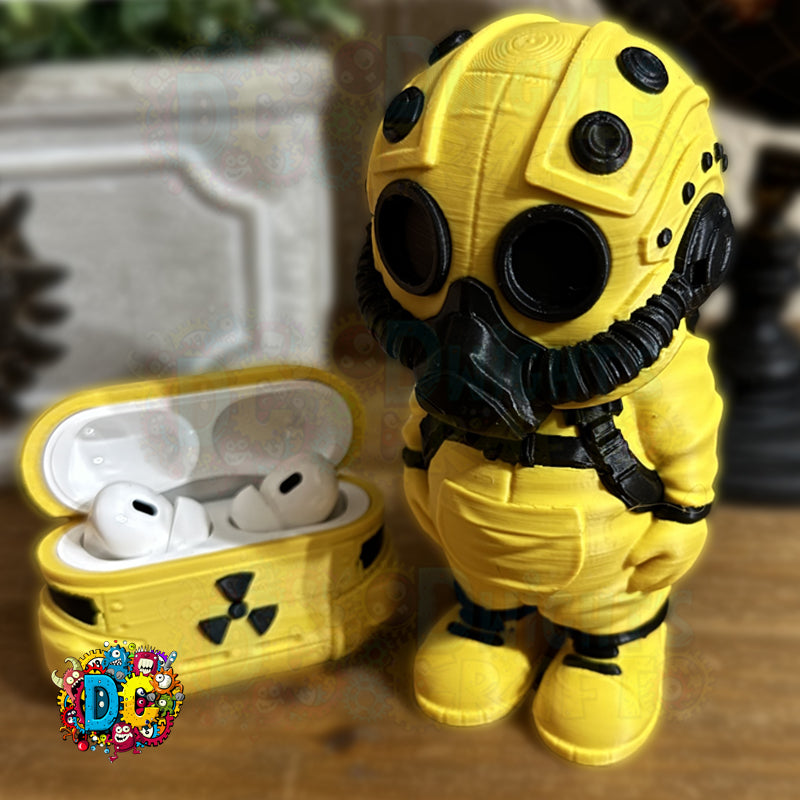 Yellow astronaut figure with open airpod case containing white earbuds on a wooden surface.