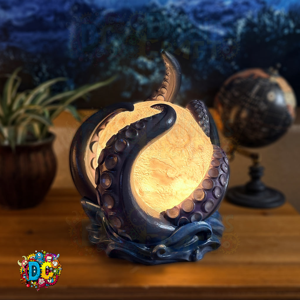 Decorative lamp shaped like an octopus with a warm glow, placed on a wooden surface with a blurred background.