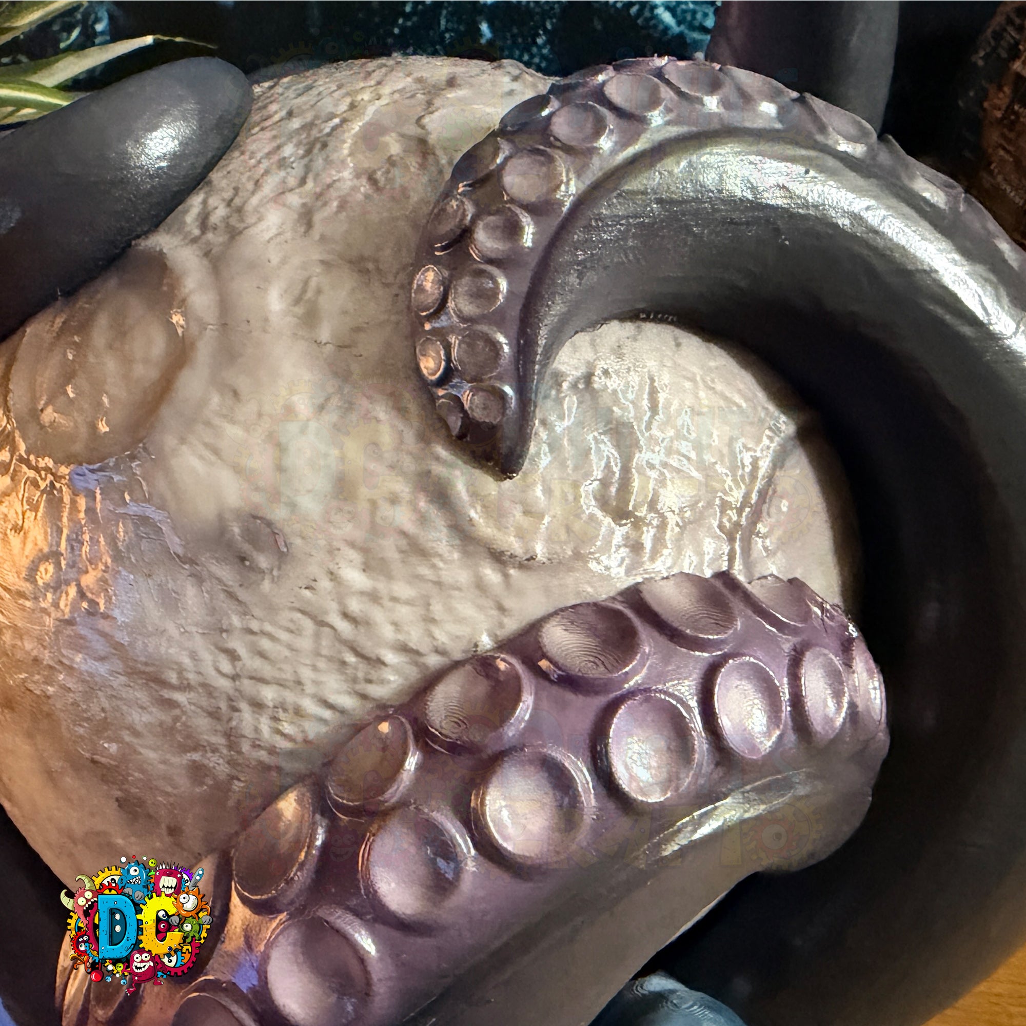 Decorative stone with octopus tentacles on a dark background