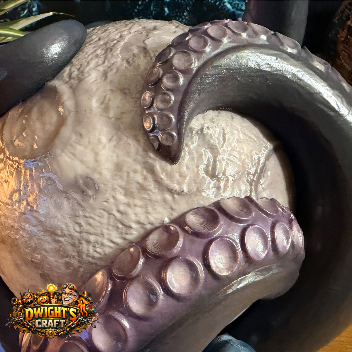 Close-up of a sculpted octopus head with textured skin and prominent suction cups on tentacles, featuring a 'Dwight's Craft' logo overlay in the bottom-left corner.
