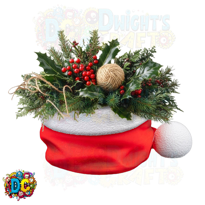Decorative arrangement in a Santa hat with greenery, berries, and twine on a white background.