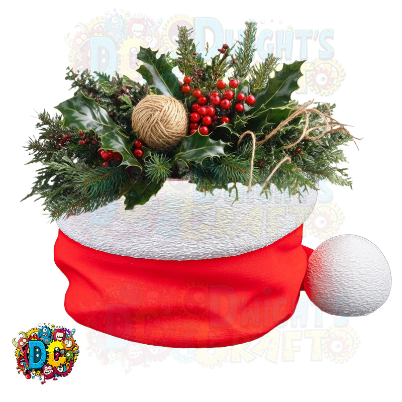 Decorative Christmas arrangement with holly leaves, berries, and a red ribbon on a white background.