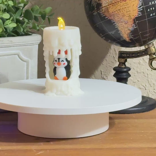 penguin flicker candle